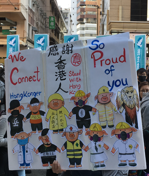 Protest sign in Hong Kong stating We connect and So Proud of You