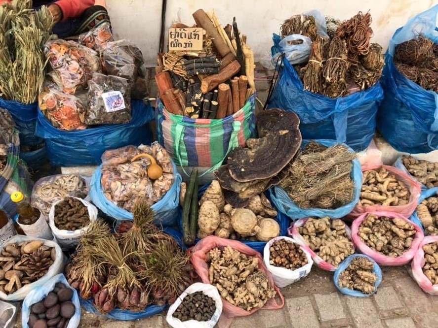 colorful small containers of various spices