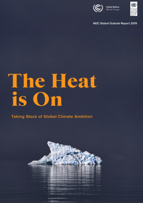 Heat Is On UN climate report cover of iceberg melting in darkness