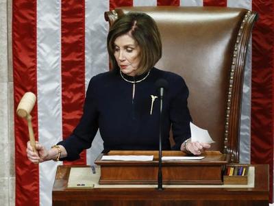 Nancy Pelosi, speaker of the US House of Representatives, calls the vote on impeachment 